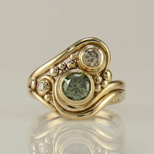 Bague vintage en or avec zircon vert