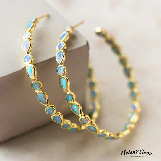 Boucles d'oreilles en opale bleue vintage avec cerceau en or